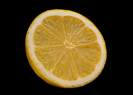 Lemon slice isolated on black backgroundの写真素材