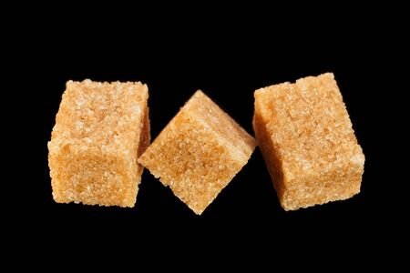 Thatched sugar cube isolated on blackの写真素材