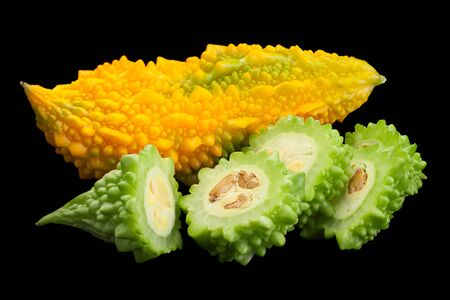 Momordica vegetable closeup isolated on black backgroundの写真素材