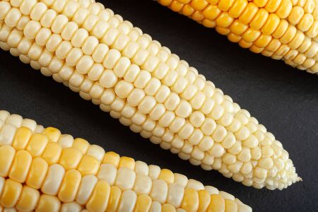Sweet corn vegatable closeup corn seeds on black background