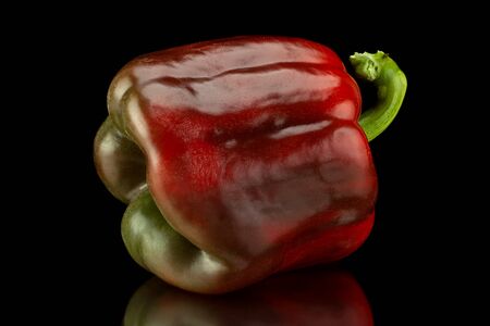 Sweet brown pepper vegetable group isolated on black background
