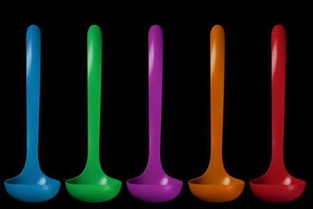 Plastic multicolor set scoop for coocking isolated blackの写真素材
