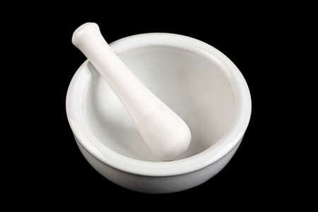 Ceramic pounder kitchenware isolated on black