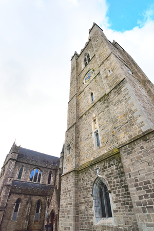 St Patrick's Cathedral clock tower low angle picture.の写真素材