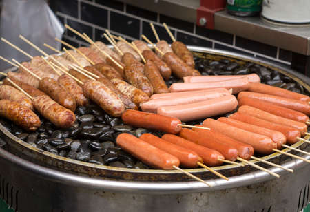 roast sausages skewer for saleの写真素材