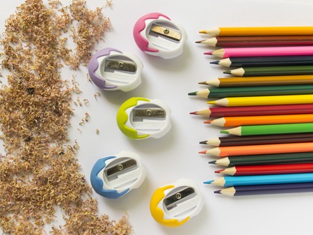 colored pencils and sharpener. school supplies.の写真素材