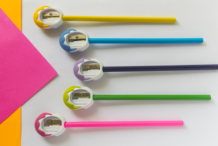 colored pencils and sharpener. school supplies.の写真素材