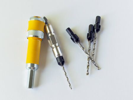 The countersink set consists of a nozzle for a quick change of the drill bit and a set of interchangeable countersink drills. Drill for screwdriver. Woodworking.の写真素材
