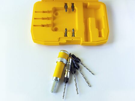 The countersink set consists of a nozzle for a quick change of the drill bit and a set of interchangeable countersink drills. Drill for screwdriver. Woodworking.の写真素材