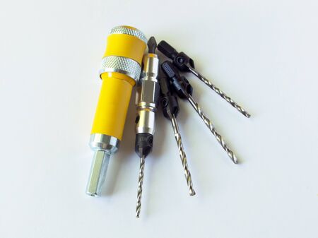 The countersink set consists of a nozzle for a quick change of the drill bit and a set of interchangeable countersink drills. Drill for screwdriver. Woodworking.の写真素材