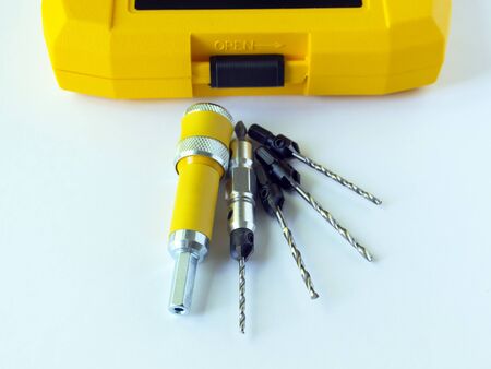 The countersink set consists of a nozzle for a quick change of the drill bit and a set of interchangeable countersink drills. Drill for screwdriver. Woodworking.の写真素材