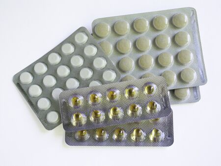 
Tablets in packs are on the table. Antibiotics from the virus. Treatment of the disease.の写真素材
