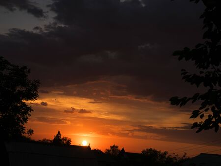 bright colorful landscape. dramatic clouds. sunset and sunrise. dusk.の写真素材