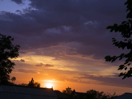 bright colorful landscape. dramatic clouds. sunset and sunrise. dusk.の写真素材