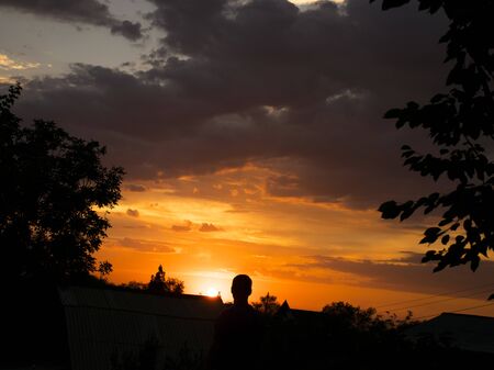 bright colorful landscape. dramatic clouds. sunset and sunrise. dusk.の写真素材