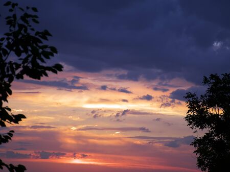 bright colorful landscape. dramatic clouds. sunset and sunrise. dusk.の写真素材