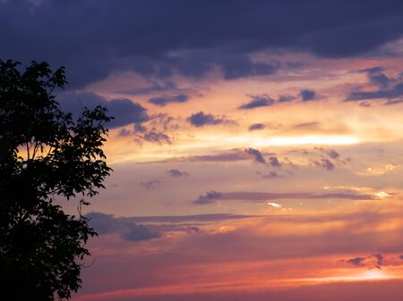 bright colorful landscape. dramatic clouds. sunset and sunrise. dusk.の写真素材