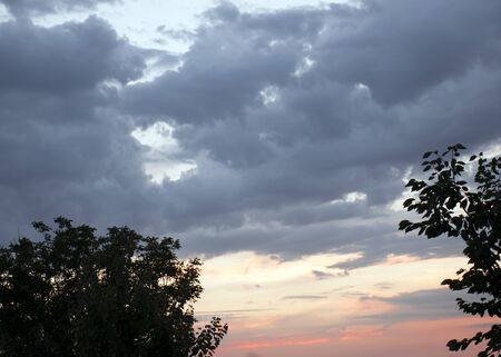 bright colorful landscape. dramatic clouds. sunset and sunrise. dusk.の写真素材