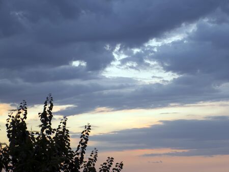bright colorful landscape. dramatic clouds. sunset and sunrise. dusk.の写真素材