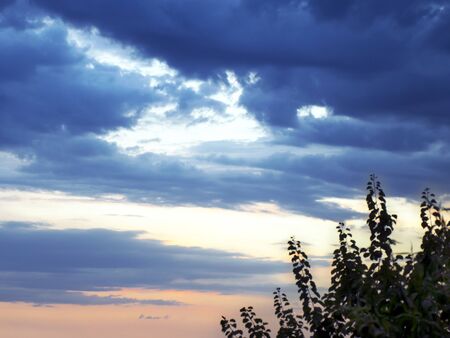 bright colorful landscape. dramatic clouds. sunset and sunrise. dusk.の写真素材