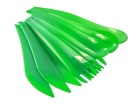 Disposable plastic picnic utensils. Bright set of dishes. Cutlery.の写真素材
