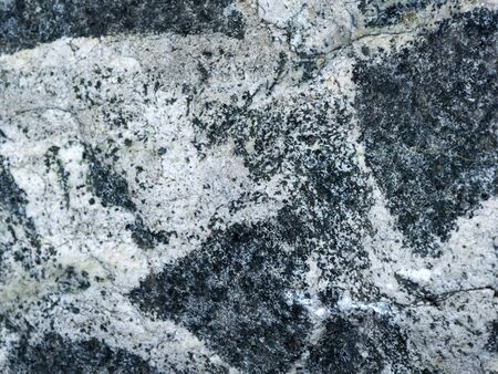 The texture of gray stone. Stone background. Natural material for construction.の写真素材