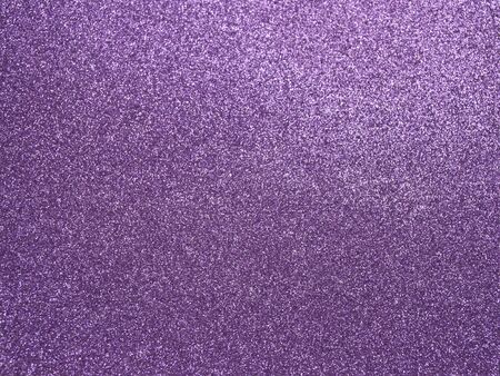 Shiny purple foamiran. Beautiful texture with glitter effect. Material for creativity.
Brilliant background.の写真素材