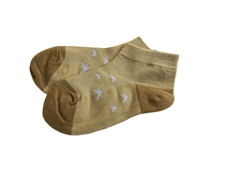 A pair of cotton socks. Striped pattern and star pattern. Childrens socks. Cotton. Isolated item.の写真素材
