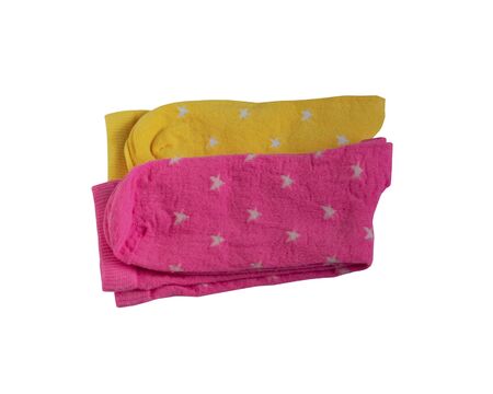 Children's multi-colored socks with a pattern of stars. Top view, isolated. Many different socks for the cold seasonsの写真素材