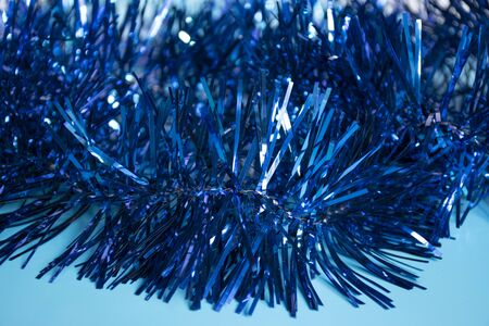 Christmas background. Christmas decoration, tinsel tones in classic blue. Copyspaceの写真素材