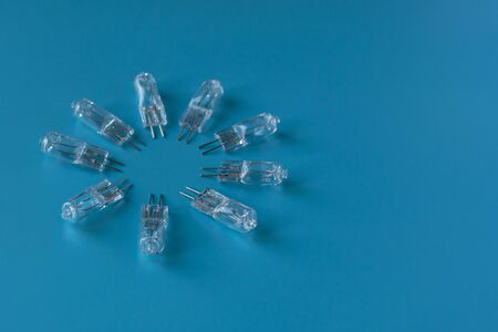 Transparent LED on a blue background. Electronic component. Diode for lightingの写真素材