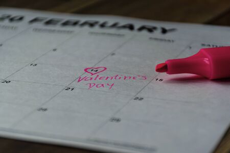 the calendar with the date of February 14 Valentine's day.