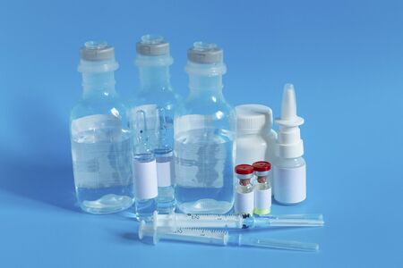 Vaccine and syringe for injection. Prevention, immunization and treatment of coronavirus infection, influenza, virus and bacteria. Medicine infectious concept.
の写真素材