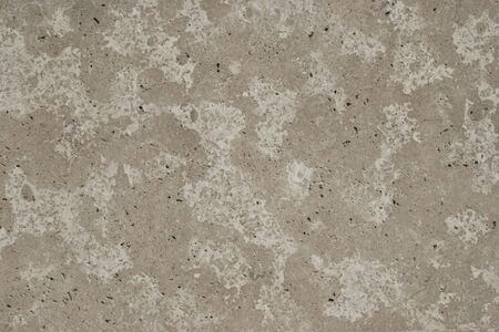 Wall of cement. Background of the old wall. Stucco in the form of marble. Urban architecture.の写真素材