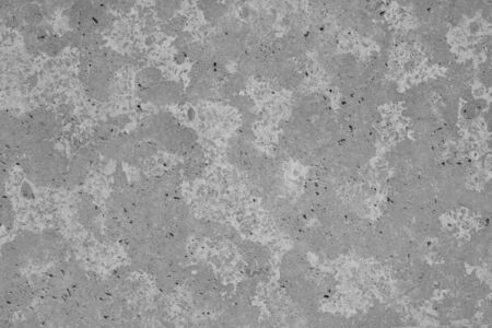 Wall of cement. Background of the old wall. Stucco in the form of marble. Urban architecture.の写真素材
