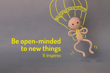 A toy man on a gray background with copy space. Presentation Keynote. Motivational phrase. A sketch...