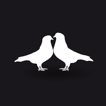 Silhouettes of two white doves on a black background.のイラスト素材