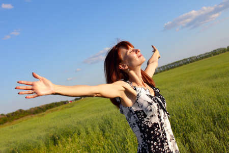 Beautiful young woman with the dissolved handsの写真素材