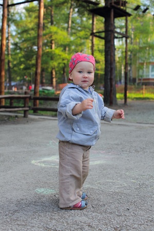 little boy walking in parkの写真素材