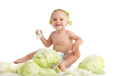 Happiness little child in cabbageの写真素材