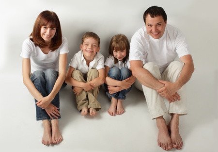 Happiness family on the white background. Many happy families search in my portfolioの写真素材