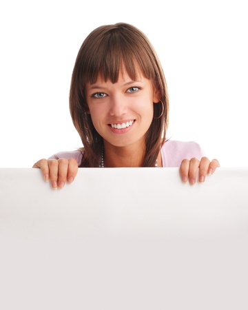 Beautiful woman with empty blank isolated on whiteの写真素材