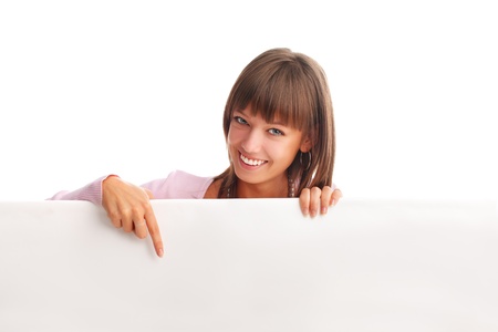 Beautiful woman with empty blank isolated on whiteの写真素材