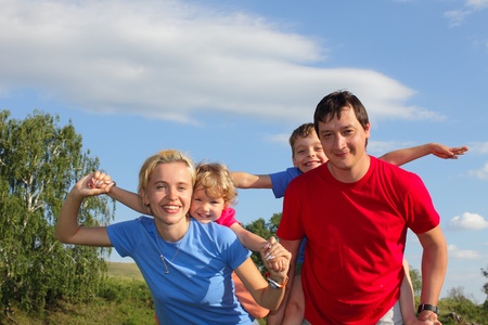 Happy family with two childrenの写真素材