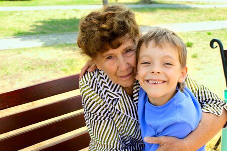 Happiness grandmother and grandson in the park. Seriesの写真素材