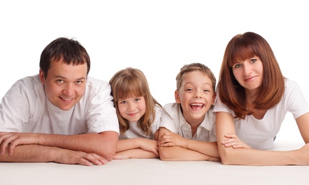 Happy family with two children isolated on white の写真素材