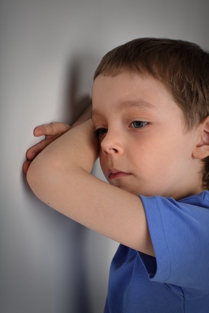 Sad boy of six yearsの写真素材