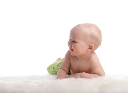 Beautiful baby looking up. Different children search in my portfolioの写真素材