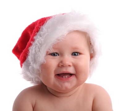 Baby child in a Christmas hatの写真素材