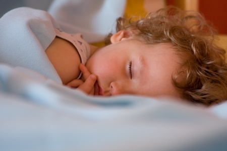Serenely sleeping a little girl の写真素材